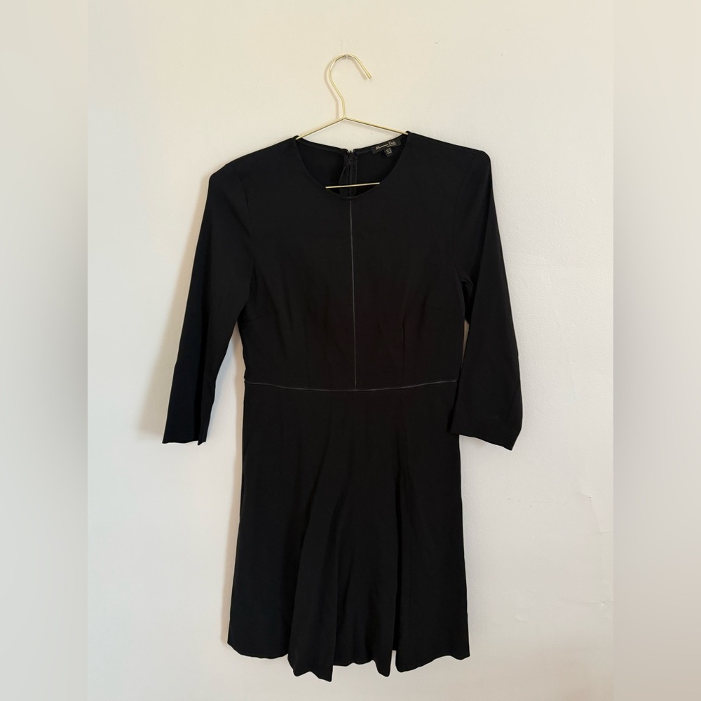 Black dress with faux leather piping